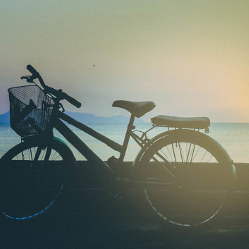 bicycle on the beach at sunset bicycle on the beach at sunset